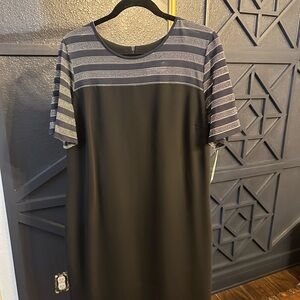 Chic Black Dress with Striped Sleeves